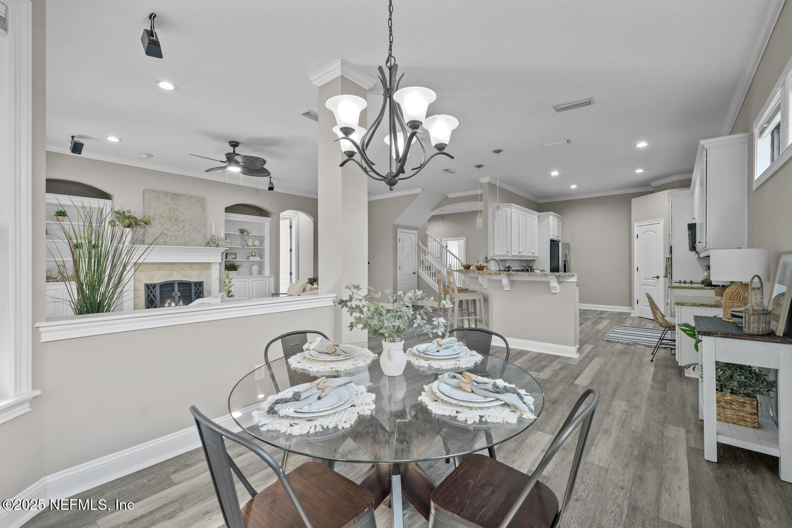 165 St John's Forest Boulevard St. Johns, FL 32259 - Photo 25 of 103 a view of a dining room with furniture and wooden floor