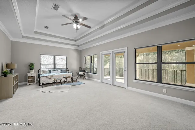 an aerial view of a house with a swimming pool