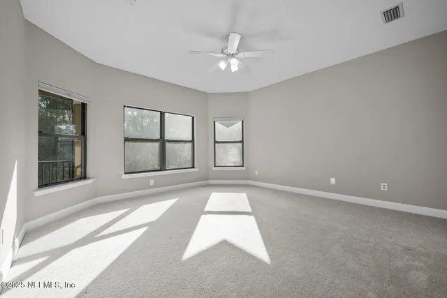 a swimming pool with outdoor seating and yard