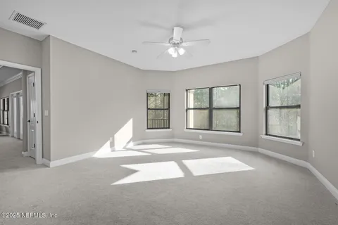 a view of a house with sitting area and garden
