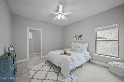 a view of a house with backyard and porch