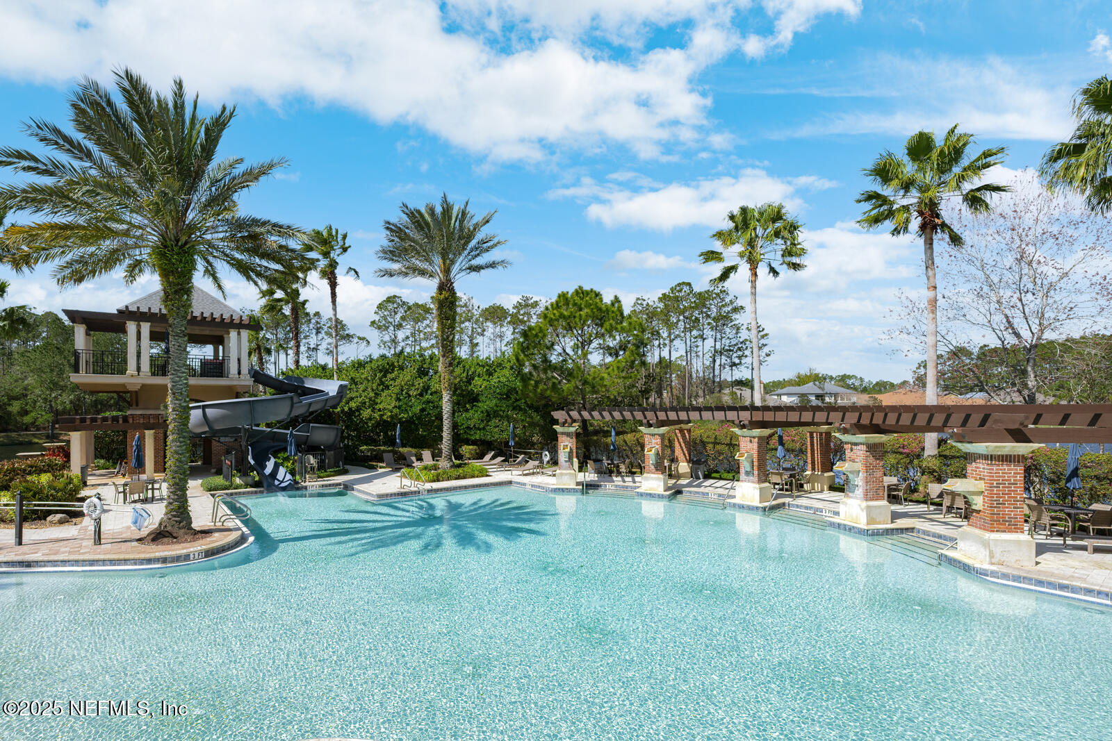 165 St John's Forest Boulevard St. Johns, FL 32259 - Photo 77 of 103 a swimming pool with outdoor seating and yard