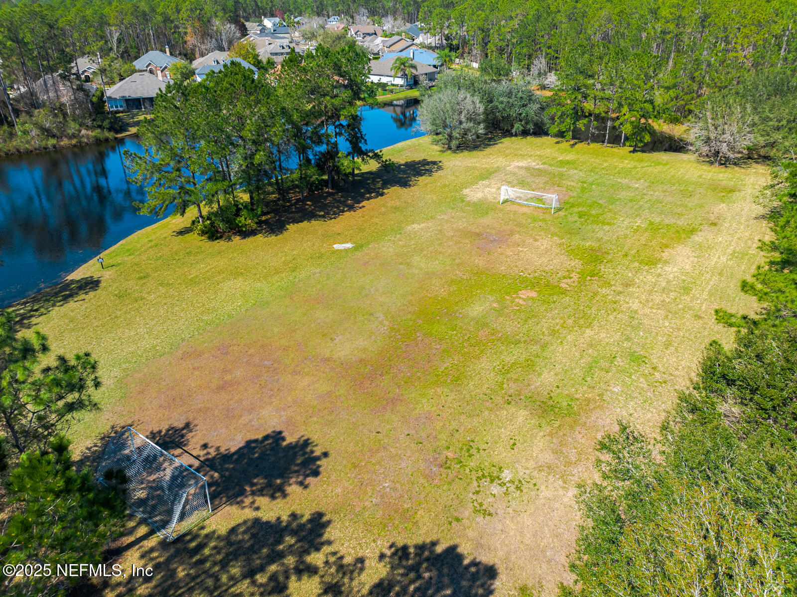 165 St John's Forest Boulevard St. Johns, FL 32259 - Photo 89 of 103 a view of swimming pool with an outdoor space and seating area
