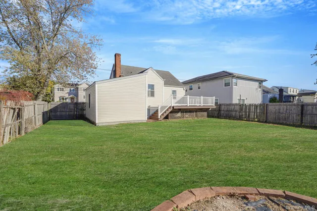 a view of a backyard with a garden