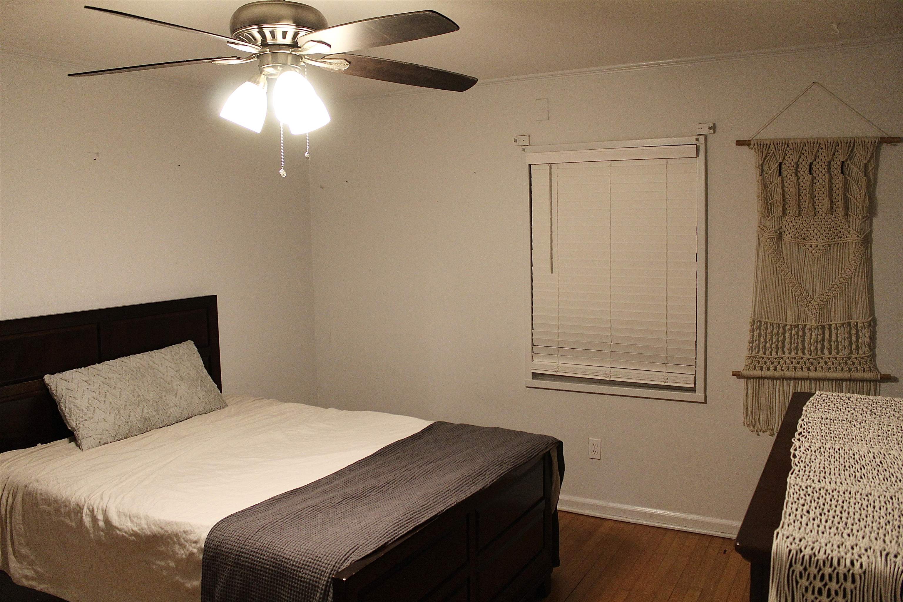 1715 Capri Road Memphis, TN 38117 - Photo 12 of 18 a bedroom with a bed and a window