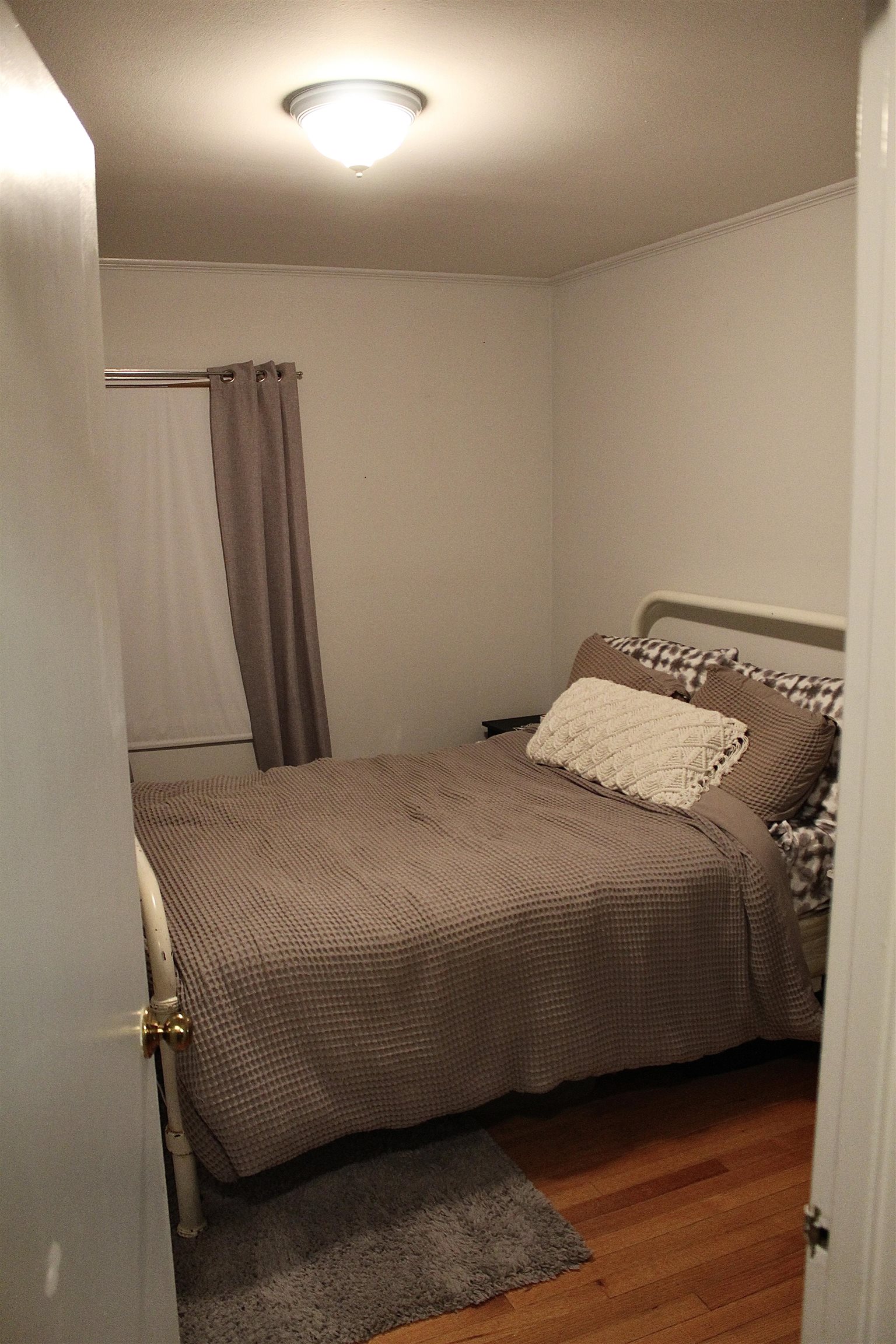 1715 Capri Road Memphis, TN 38117 - Photo 14 of 18 a bedroom with a bed and a window