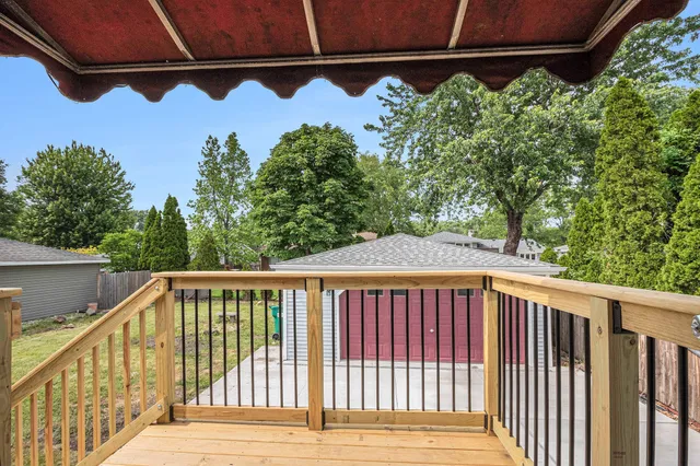 a view of a balcony with plants