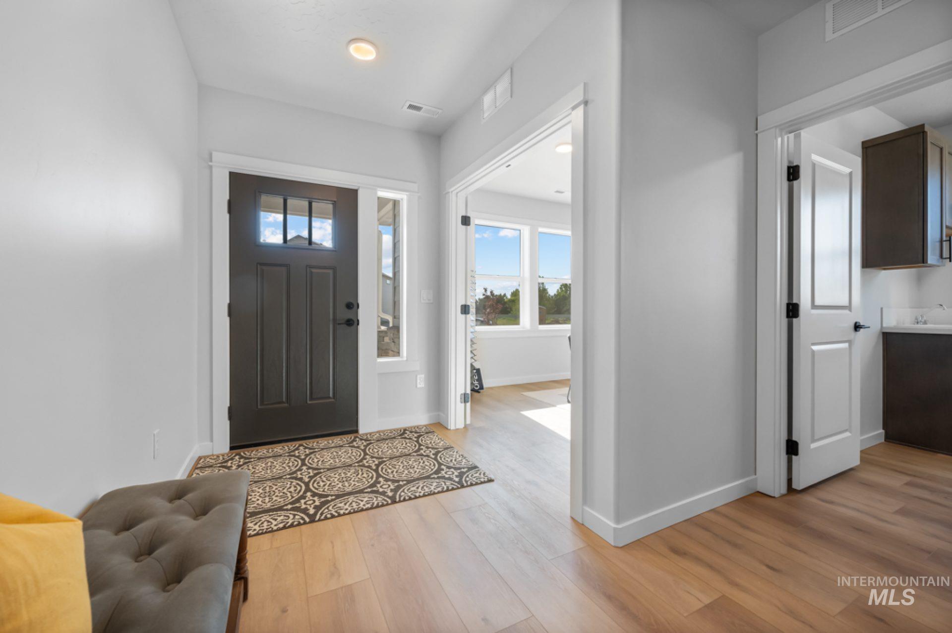 3347 East Fitz Roy Street Kuna, ID 83634 - Photo 11 of 15 Entrance foyer with light wood-type flooring and baseboards