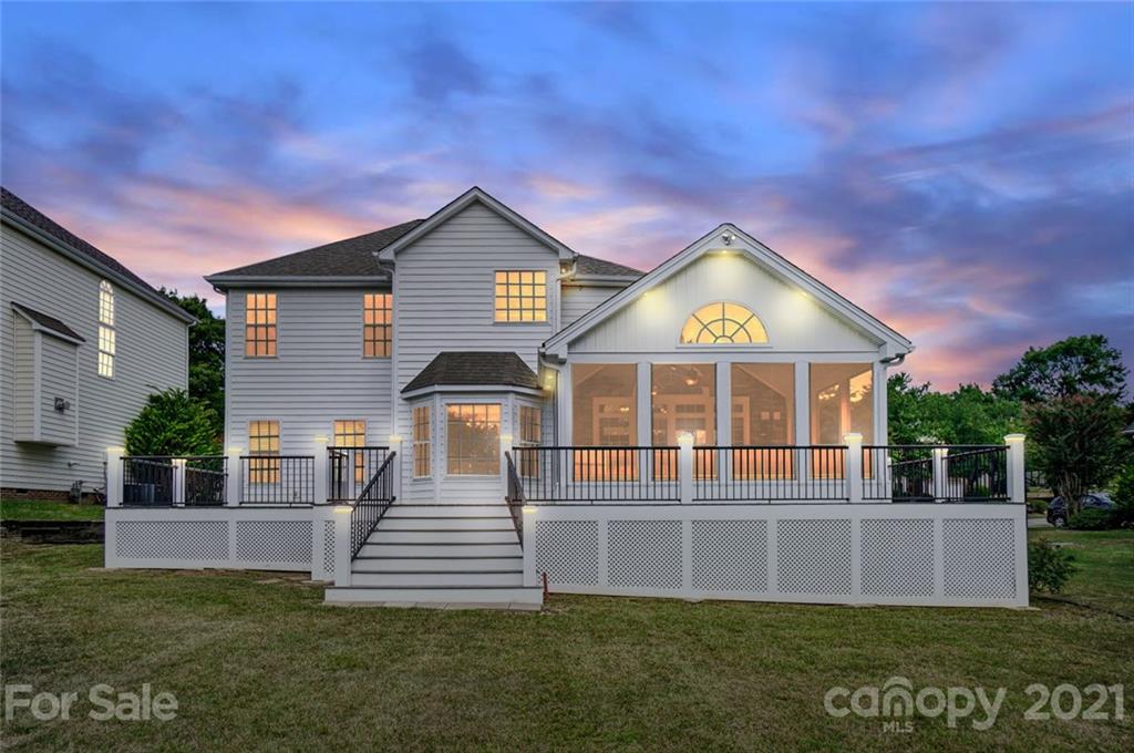 15922 Hollingbourne Road Huntersville, NC 28078 - Photo 2 of 48 a front view of a house with a yard