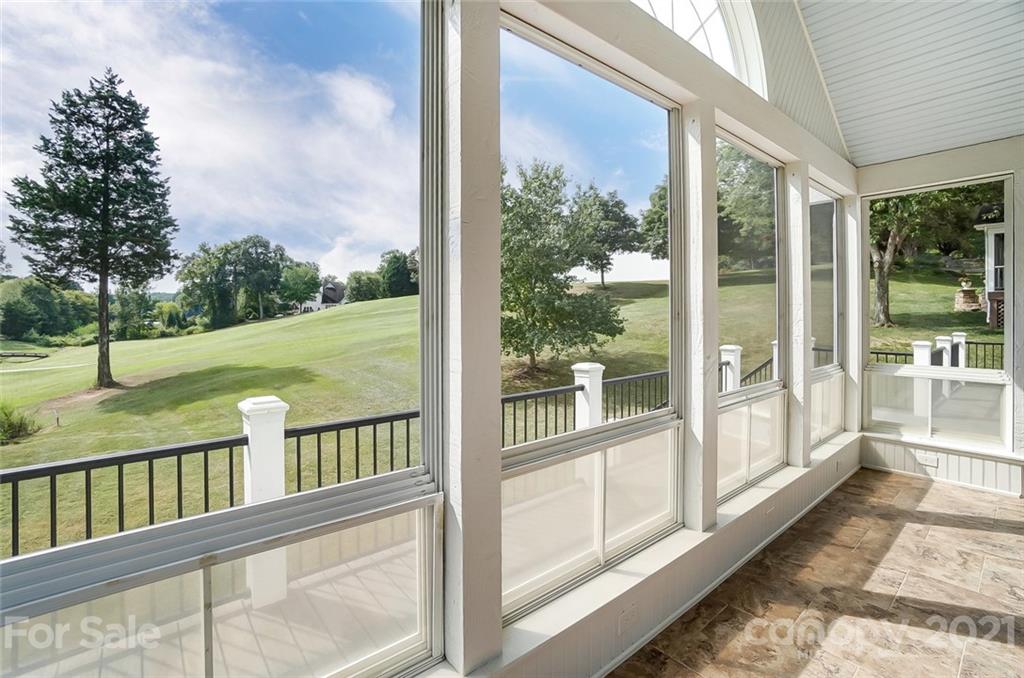 15922 Hollingbourne Road Huntersville, NC 28078 - Photo 19 of 48 a view of a porch with a big yard and large trees
