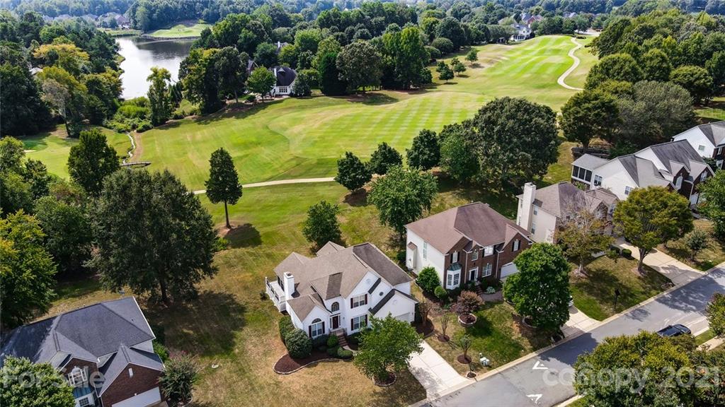 15922 Hollingbourne Road Huntersville, NC 28078 - Photo 4 of 48 an aerial view of a house with a garden