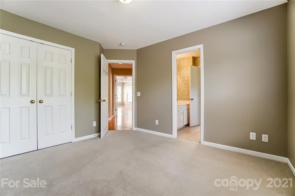 15922 Hollingbourne Road Huntersville, NC 28078 - Photo 34 of 48 an empty room with windows