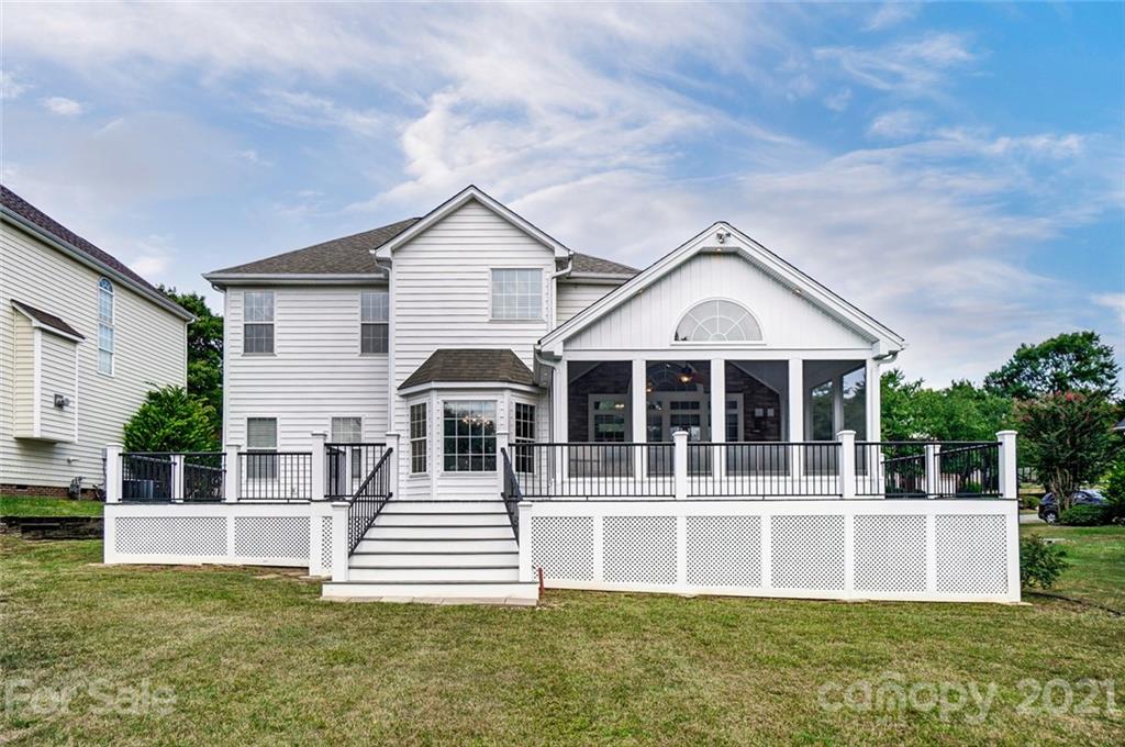 15922 Hollingbourne Road Huntersville, NC 28078 - Photo 40 of 48 a front view of a house with a yard
