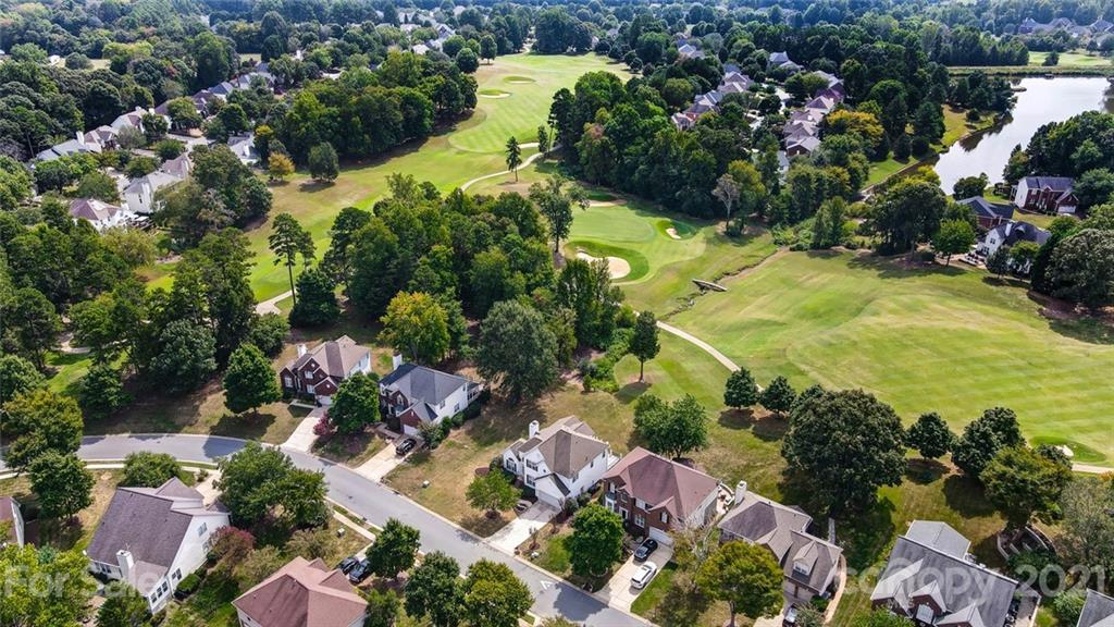 15922 Hollingbourne Road Huntersville, NC 28078 - Photo 5 of 48 an aerial view of residential houses with outdoor space and swimming pool