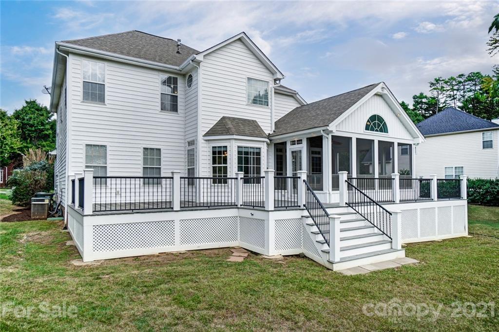 15922 Hollingbourne Road Huntersville, NC 28078 - Photo 41 of 48 a view of a house with a yard and sitting area