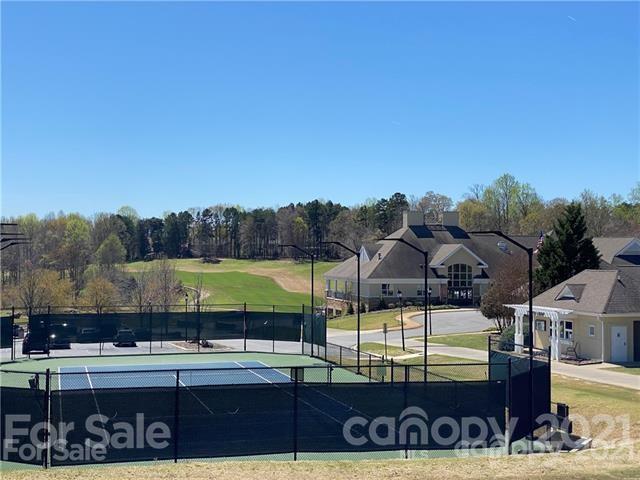 15922 Hollingbourne Road Huntersville, NC 28078 - Photo 47 of 48 a view of a swimming pool with a yard