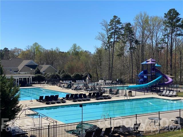 15922 Hollingbourne Road Huntersville, NC 28078 - Photo 48 of 48 a view of a lake with a house