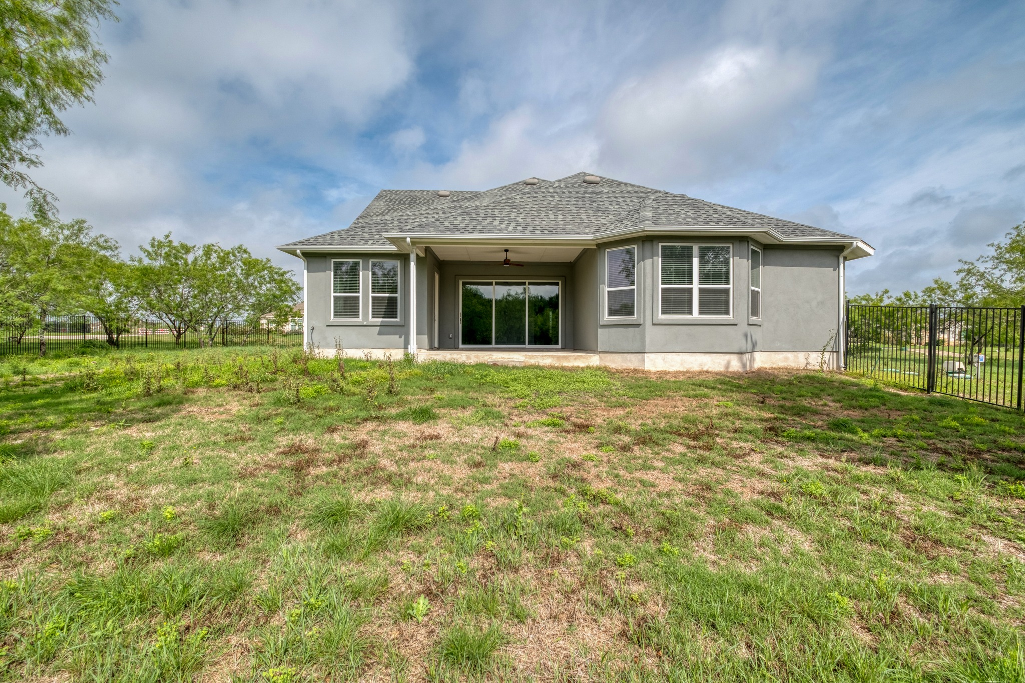359 Raptor Beak Way Cedar Creek, TX 78612 - Photo 29 of 29 With a full acre of land, this large backyard is a blank canvas for gardening, a future pool, or just enjoying the wide-open Texas views