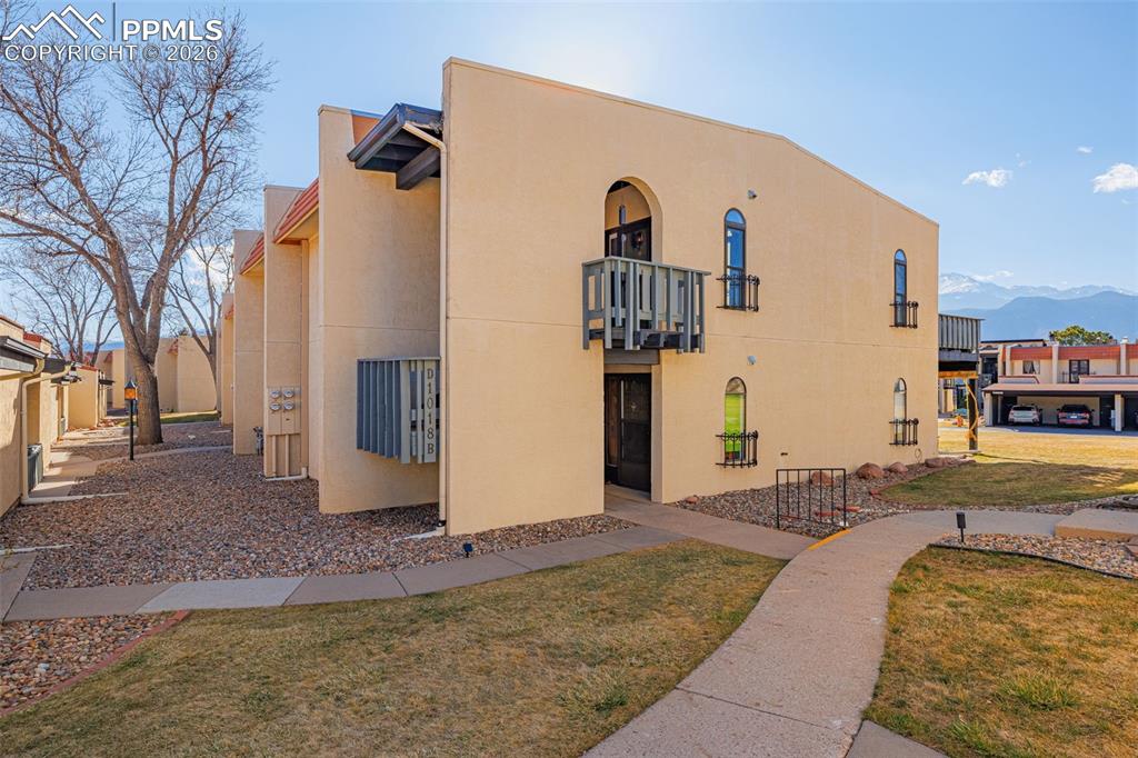 1018 Fontmore Road, Unit C Colorado Springs, CO 80904 - Photo 1 of 33 a view of a house with snow on the ground