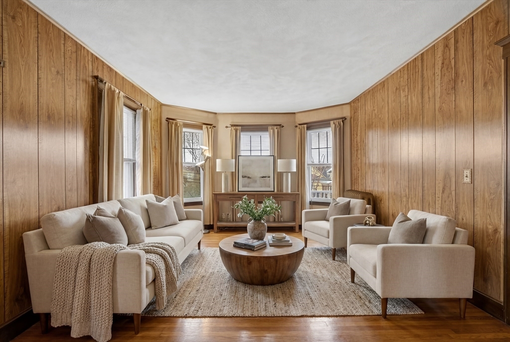 67 Irving Street Somerville, MA 02144 - Photo 22 of 40 a living room with furniture and a large window