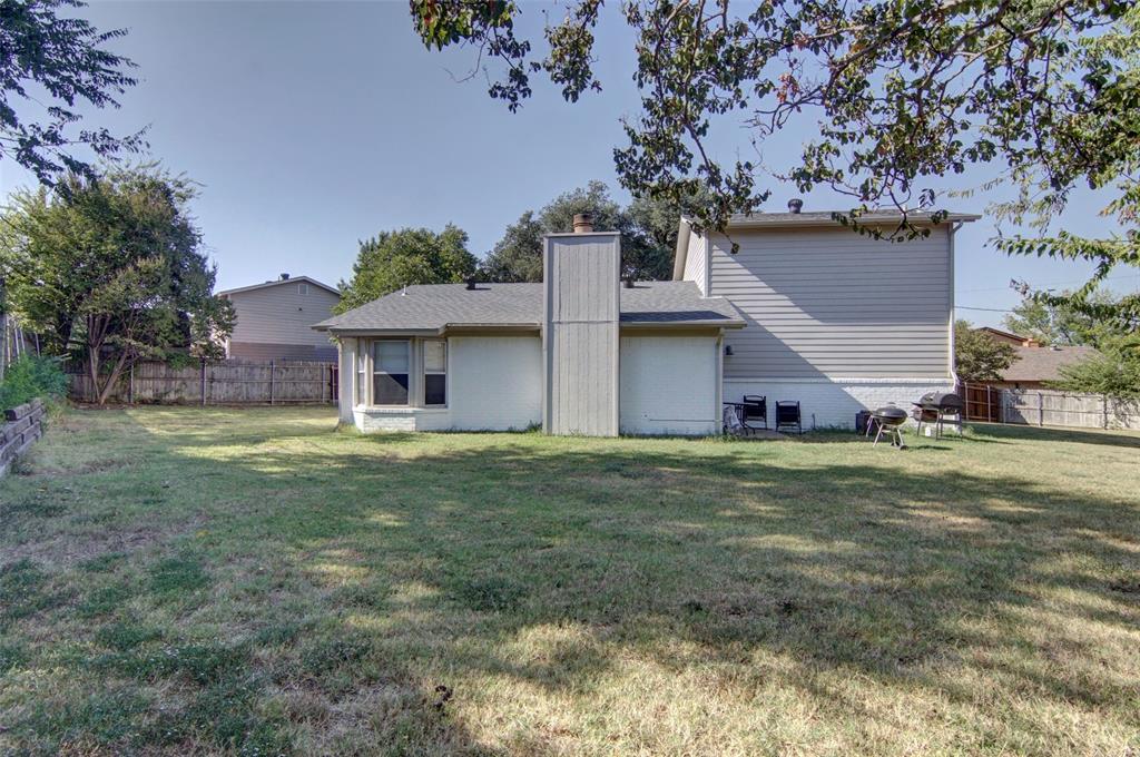 6004 Old Mill Court Watauga, TX 76148 - Photo 24 of 26 a view of a house with a yard