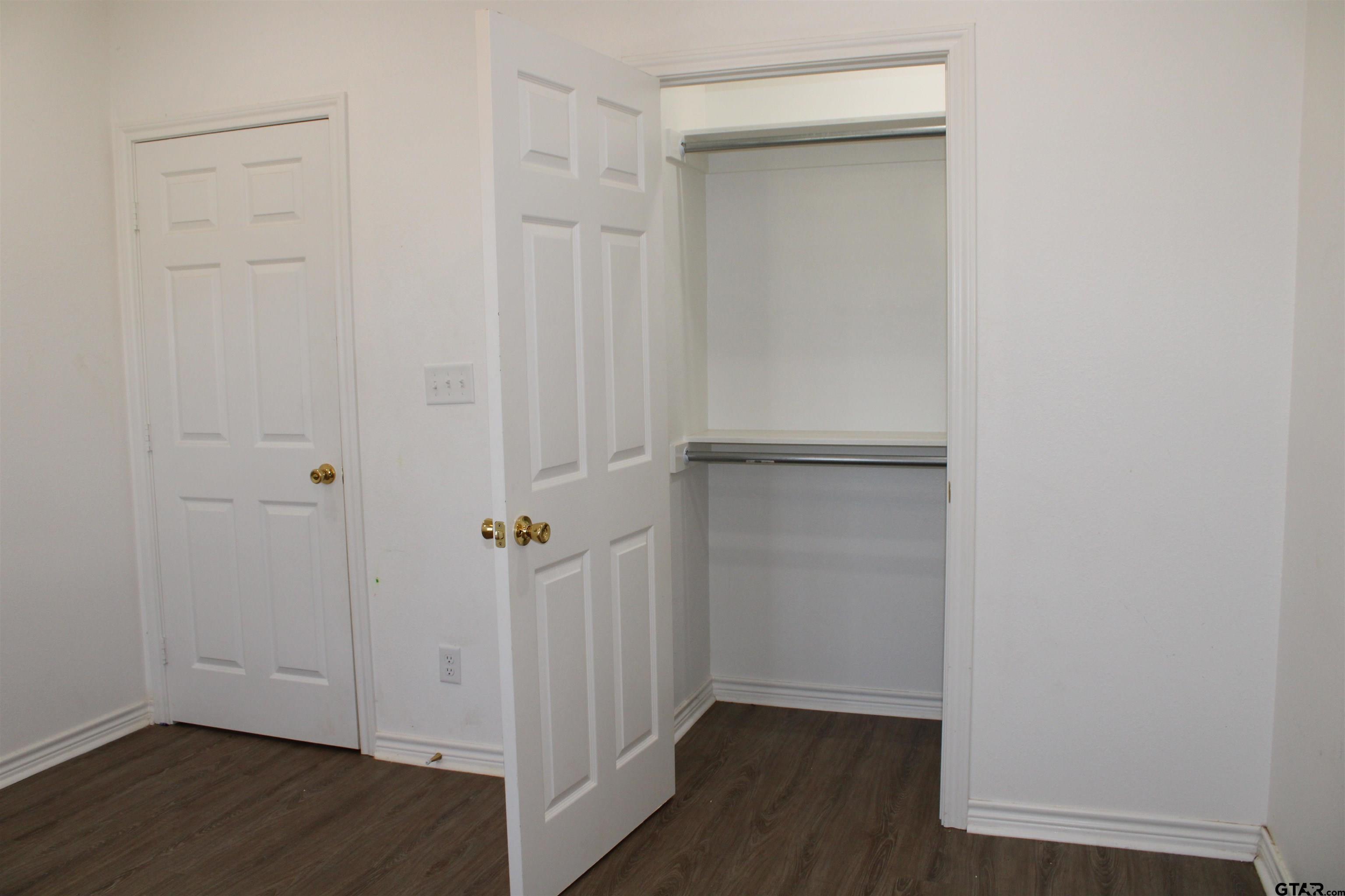 14965 Turtle Crk Rnch Road Flint, TX 75762 - Photo 15 of 26 an empty room with wooden floor