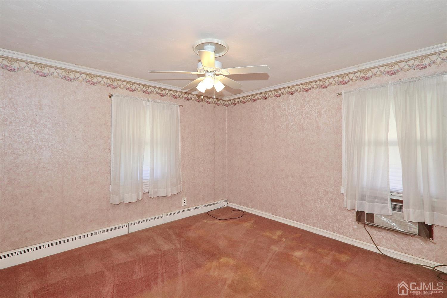 170 East Hill Road Colonia, NJ 07067 - Photo 18 of 25 a view of a chandelier and window in a room