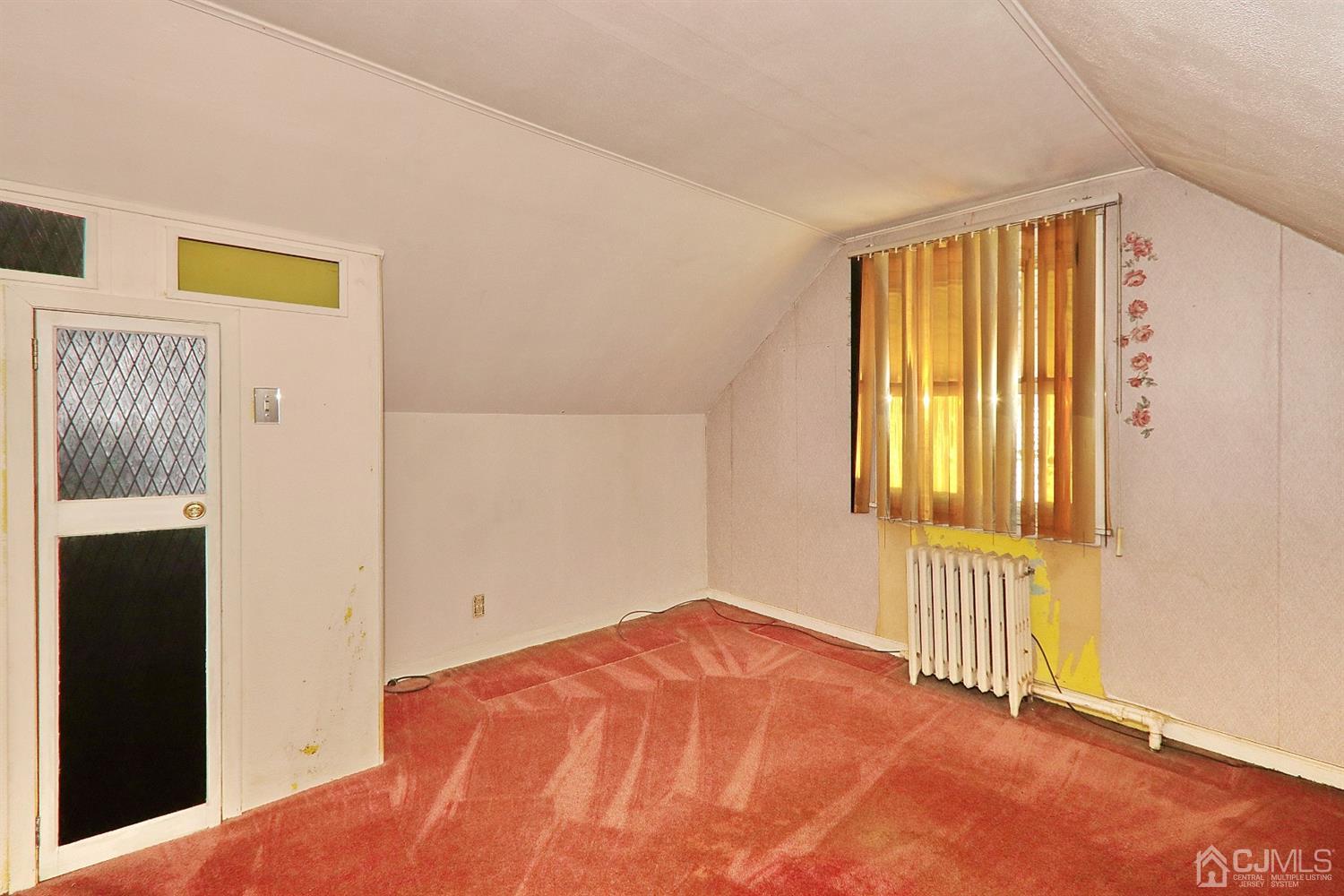 170 East Hill Road Colonia, NJ 07067 - Photo 20 of 25 a bedroom with a bed and a window