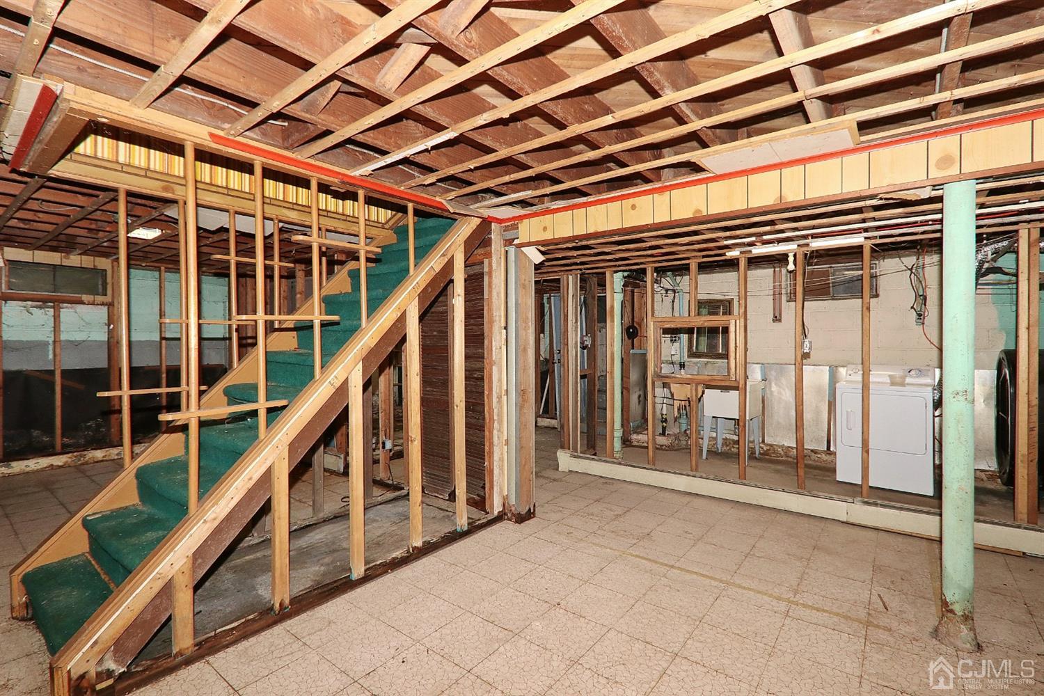 170 East Hill Road Colonia, NJ 07067 - Photo 21 of 25 a view of entryway with wooden floor and stairs