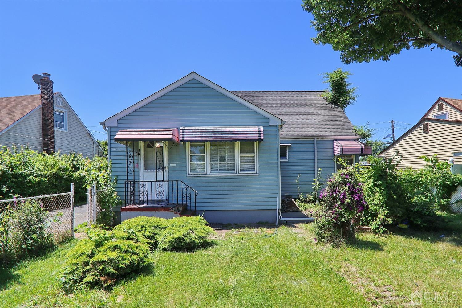 170 East Hill Road Colonia, NJ 07067 - Photo 22 of 25 a front view of a house with a yard