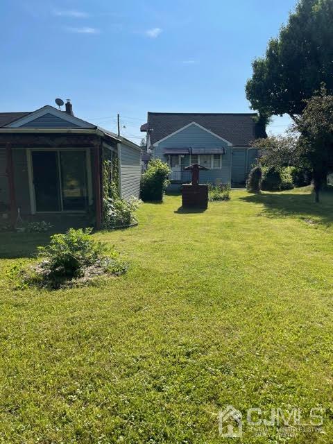 170 East Hill Road Colonia, NJ 07067 - Photo 5 of 25 a view of a house with a yard