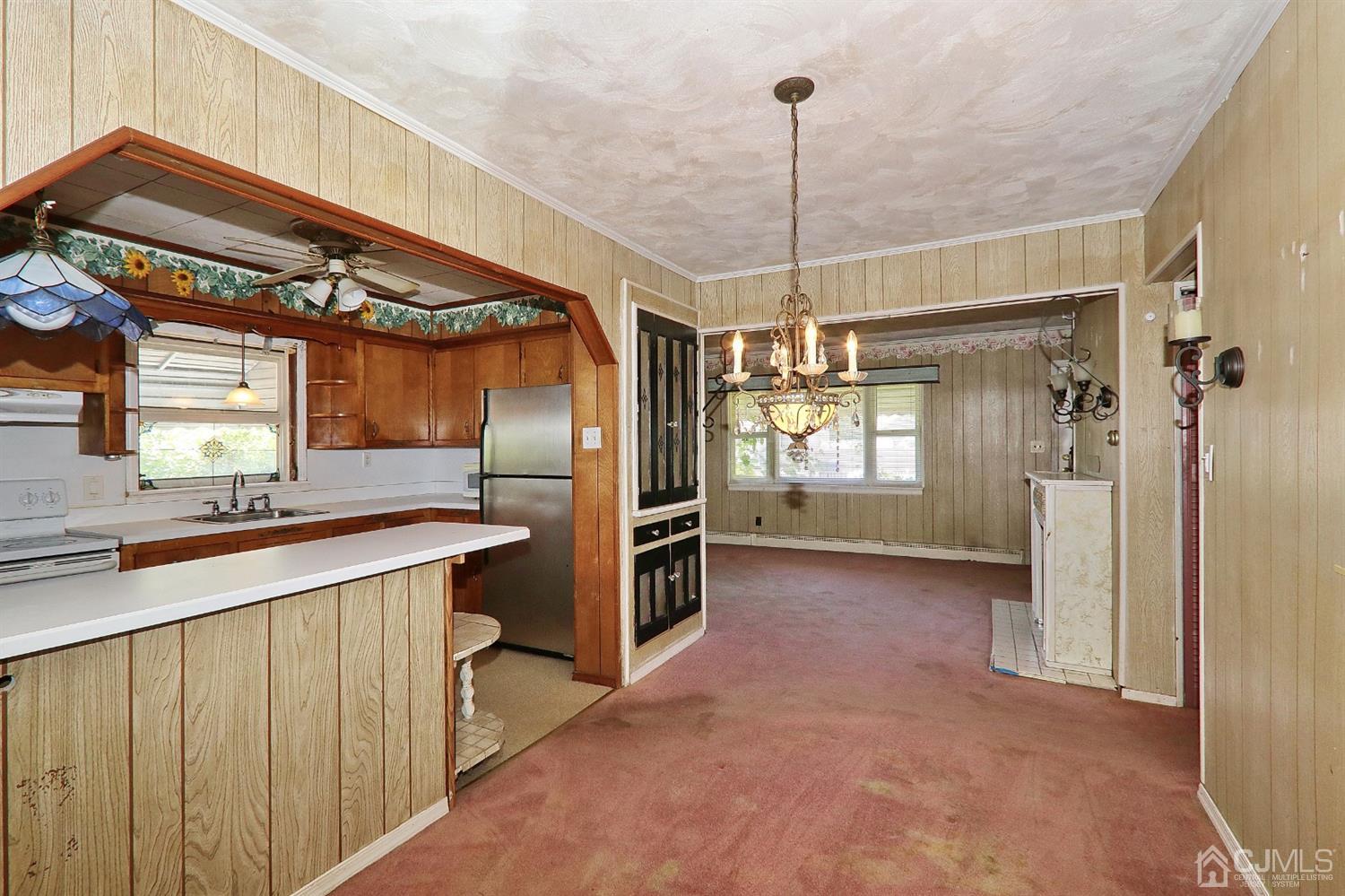170 East Hill Road Colonia, NJ 07067 - Photo 9 of 25 a kitchen with a refrigerator a sink and dishwasher