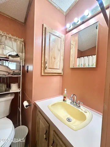 a bedroom with a bed and a table