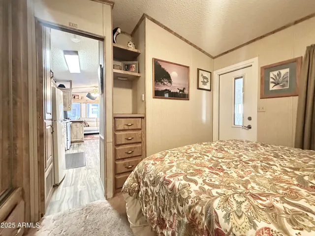 a view of a patio with a table and chairs