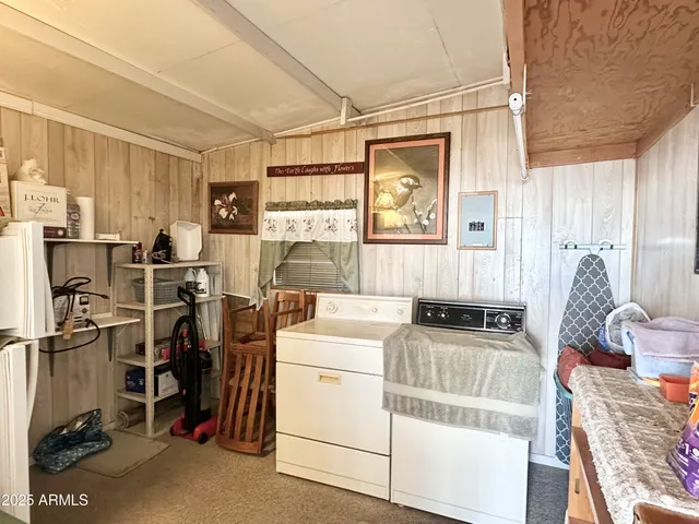 a view of swimming pool with outdoor seating