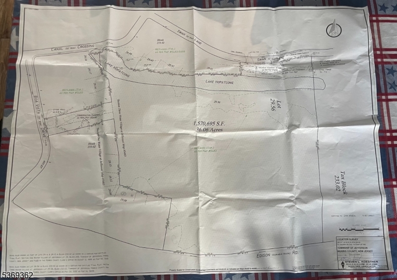 0 Swan Lane Lake Hopatcong, NJ 07849 - Photo 1 of 1 a bathroom with a glass shower door