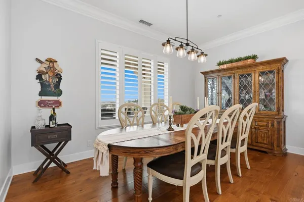 a kitchen with appliances cabinets and a window