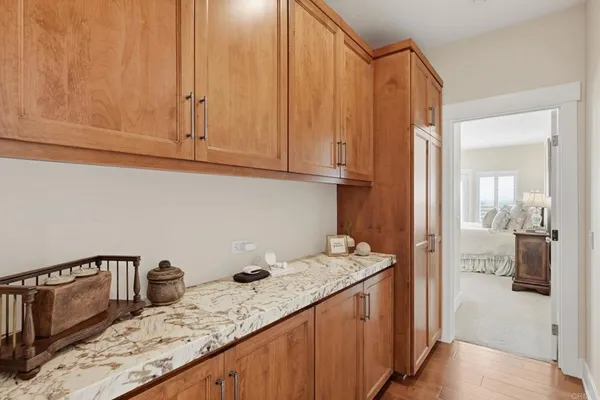 a white bath tub sitting next to a white sink