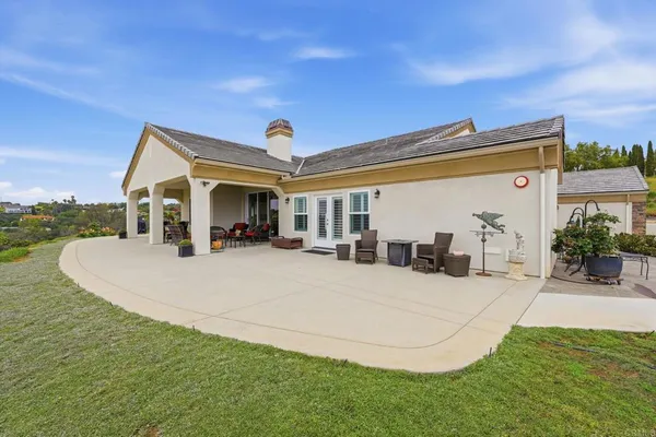 a view of a yard with an outdoor space