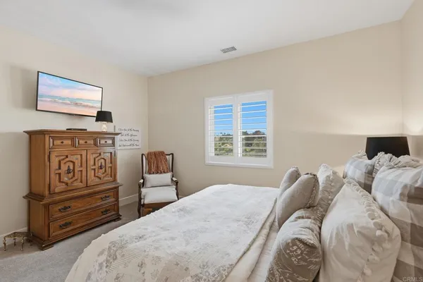 a view of a field with an trees