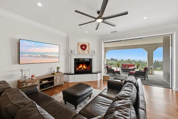 a view of a lobby with furniture and floor to ceiling window