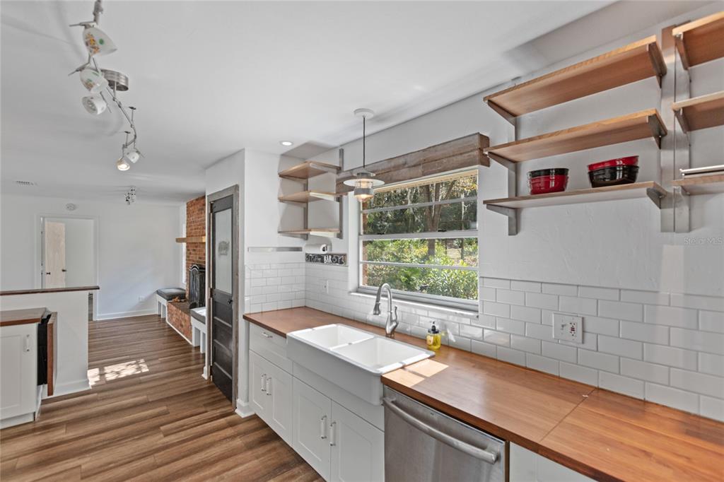 730 Highway 26 Melrose, FL 32666 - Photo 53 of 80 a kitchen with a sink and a large window