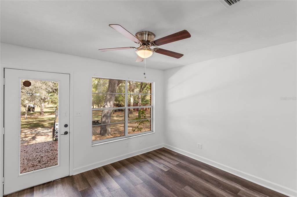 730 Highway 26 Melrose, FL 32666 - Photo 61 of 80 a view of room with window and ceiling fan