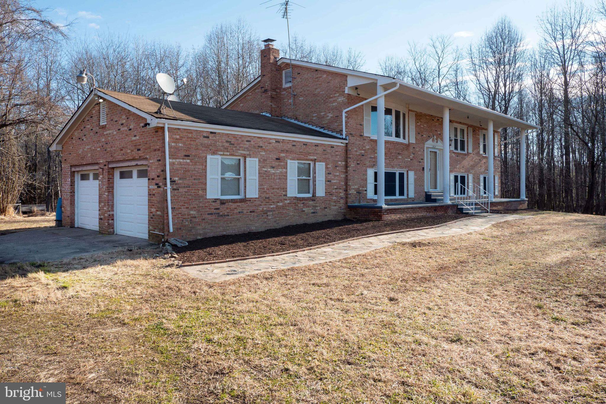 17827 Horsehead Road Brandywine, MD 20613 - Photo 27 of 43 Home features custom concrete walk & 2-car garage