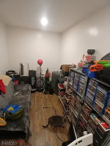 a room with furniture and a flat screen tv