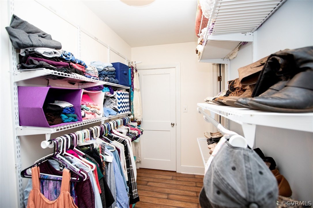 1213 West Osborn Road Farmville, VA 23901 - Photo 21 of 37 a view of walk in closet with clothes and shoes