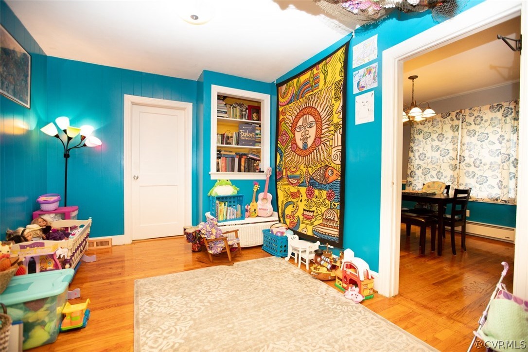 1213 West Osborn Road Farmville, VA 23901 - Photo 23 of 37 a bedroom with furniture and a large window