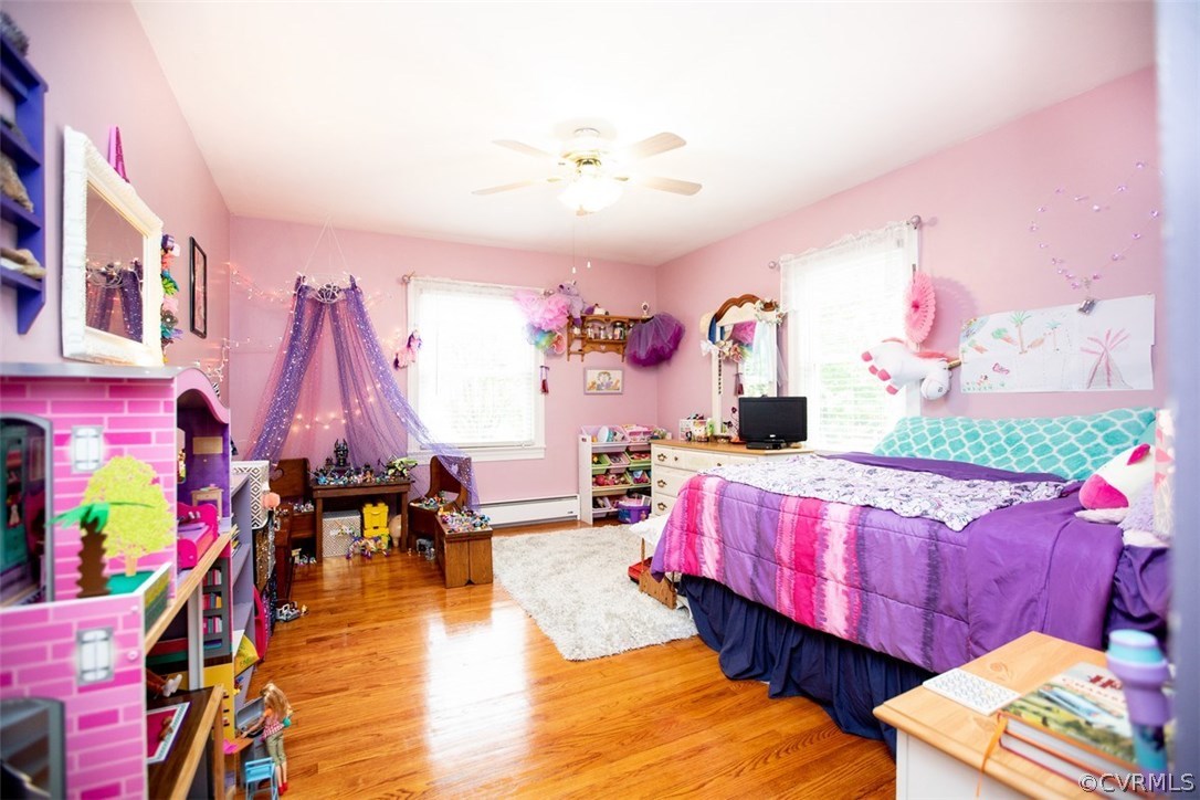 1213 West Osborn Road Farmville, VA 23901 - Photo 24 of 37 a bed room with a bed and a couch