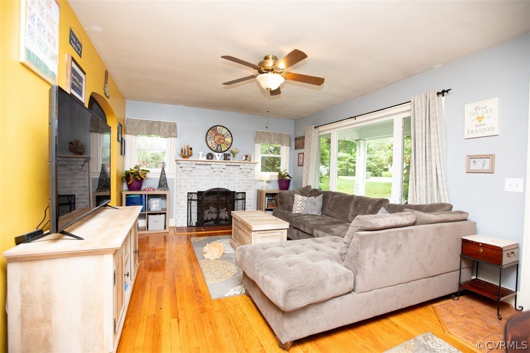 1213 West Osborn Road Farmville, VA 23901 - Photo 4 of 37 a living room with furniture and a fireplace