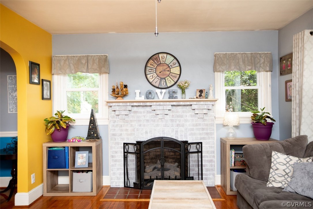 1213 West Osborn Road Farmville, VA 23901 - Photo 7 of 37 a living room with a fireplace furniture and a large window